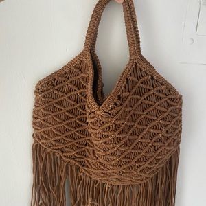 Brown boho shoulder/hobo bag with tassels.
